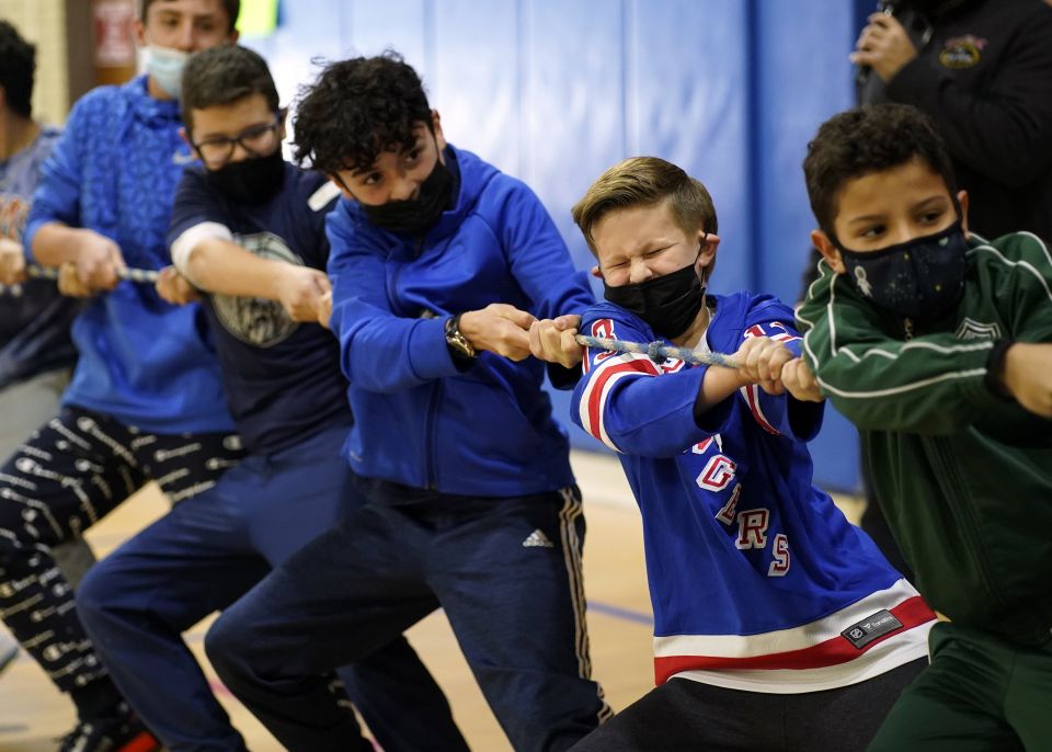 Students compete in a game of tug of war Feb. 1, 2022, at St. Patrick School in Smithtown, N.Y. The event was one of many special activities scheduled by the school to celebrate Catholic Schools Week. (CNS photo/Gregory A. Shemitz)
