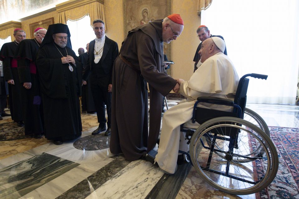 Pope Francis greets Cardinal Anders Arborelius of Stockholm, Sweden, during a meeting with members of the Pontifical Council for Promoting Christian Unity at the Vatican May 6, 2022. (CNS photo/Vatican Media)
