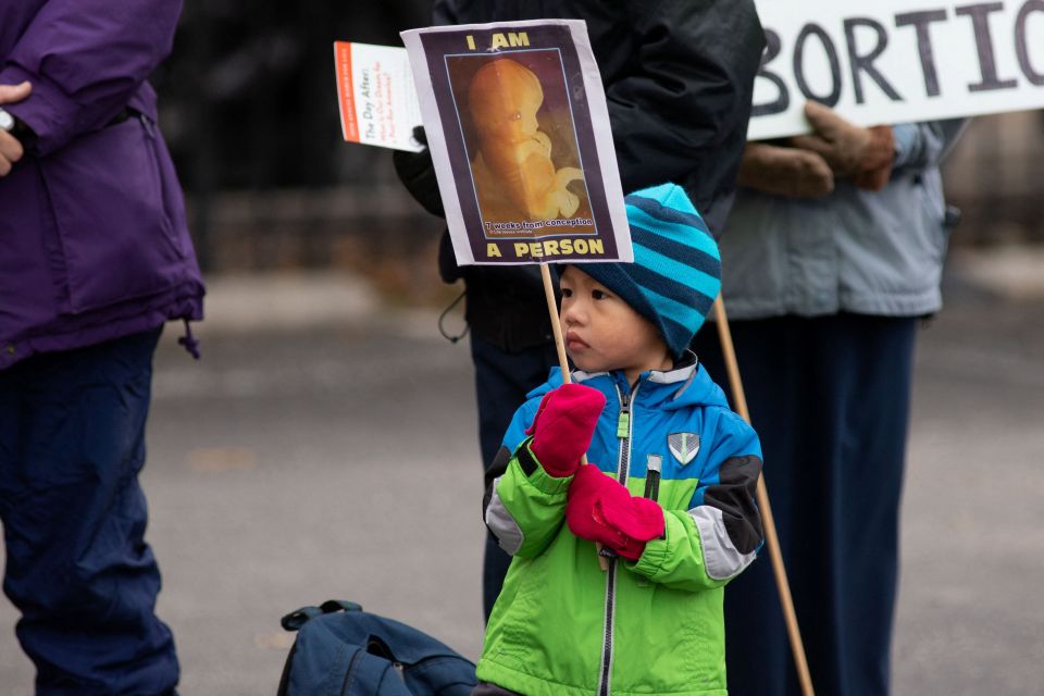 A child takes part in a March for Life rally in Dallas Jan. 15, 2022. (CNS photo/Kaylee Greenlee Beal, Reuters) 