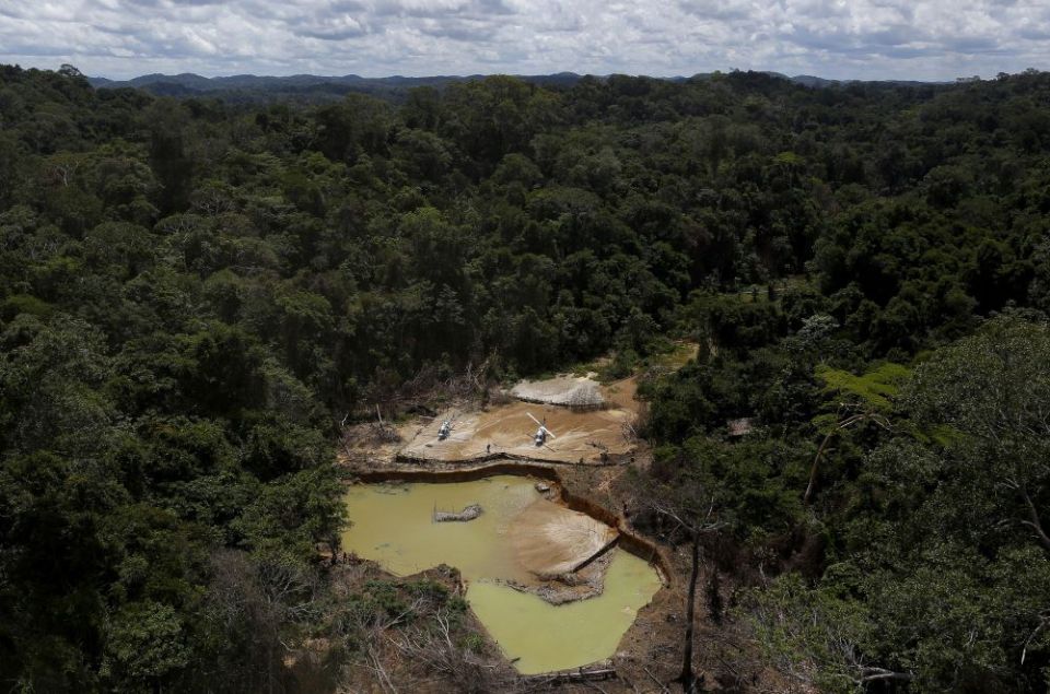 An illegal gold mine is pictured in this photo during an operation by Brazil's environmental agency against illegal gold mining on indigenous lands in the heart of the Amazon rainforest on April 17, 2016. (CNS/Reuters/Bruno Kelly)